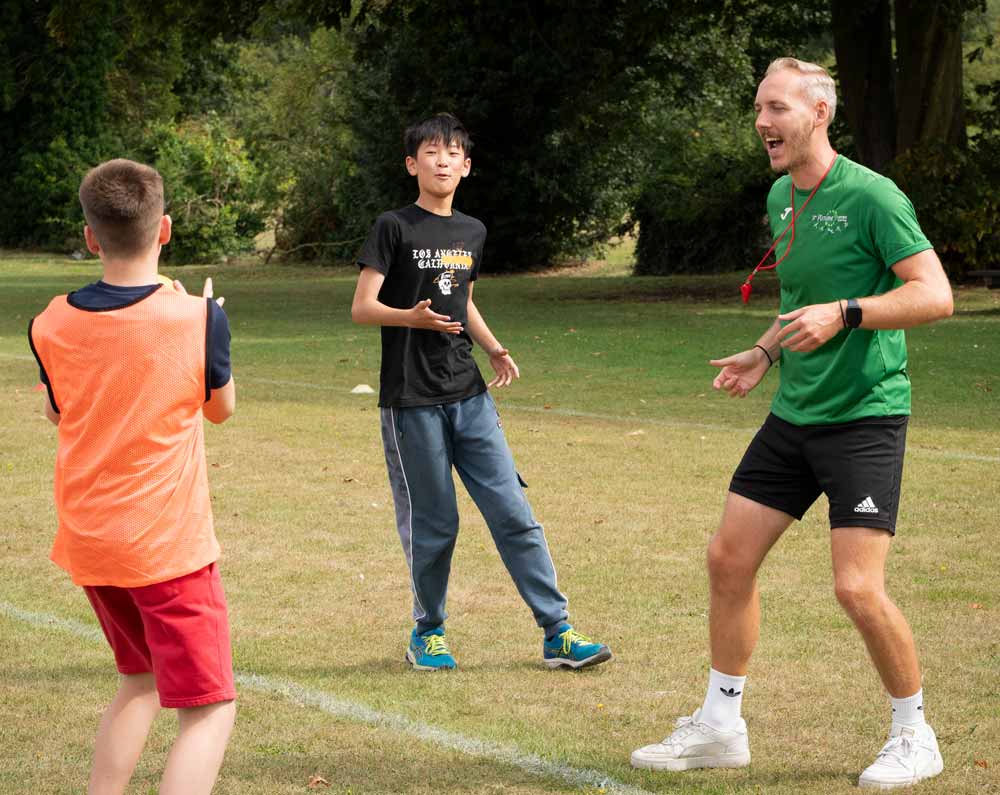 TFG Camps coach leading children in sports activities