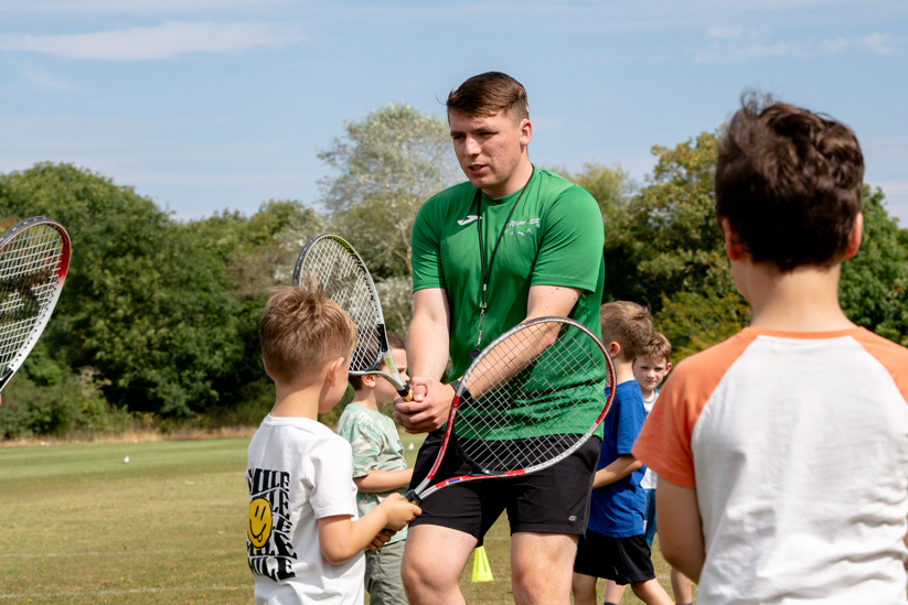 TFG Camps coaches with children at holiday sports camp